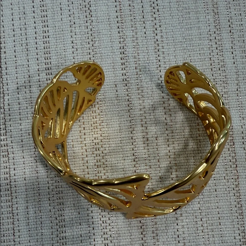 Elegant Gold Cuff Bracelet - Picture 2 of 9